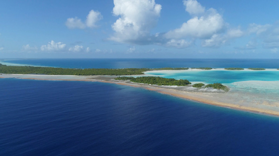 Rangiroa, aerial view of the blue lagoon, islets and barrier reef, 4K UHD