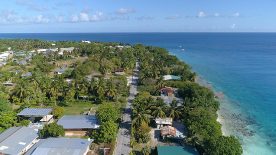 Rangiroa, aerial view of the village Tiputa and the street, 4K UHD