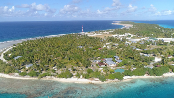 Rangiroa, aerial view of the village Tiputa and reef, 4K UHD