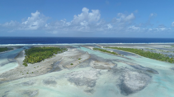 Tikehau, aerial view of islets of the barrier reef, 4K UHD