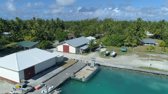 Tikehau, aerial view of the dock of the village and hangar, 4K UHD