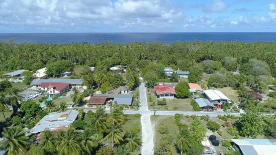 Tikehau, aerial view of the village and coconut grove, 4K UHD