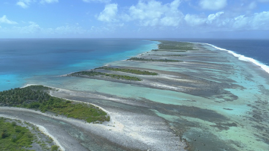 Tikehau, aerial view of the lagoon and barrier reef, 4K UHD