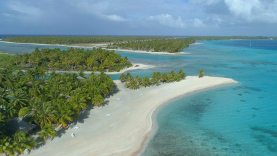 Tikehau, aerial view of the white sand beach and lagoon, 4K UHD