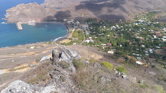 Ua Pou, aerial view of the village Hakahau and its bay, 4K UHD