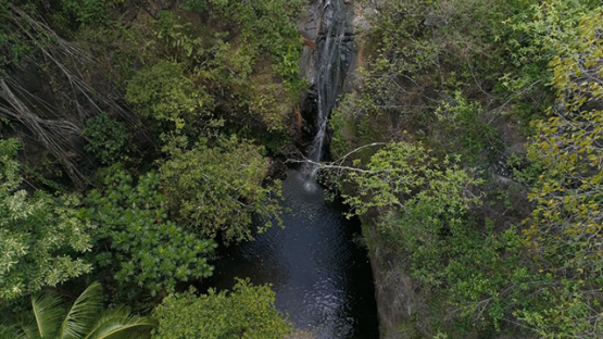 Ua Pou, aerial view of waterfall in Hakahetau valley, 4K UHD