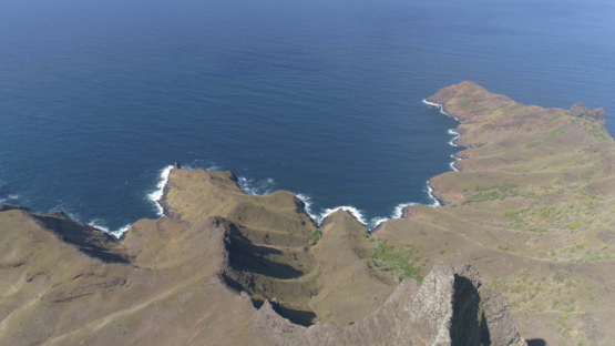 Nuku Hiva, aerial view of the coast of Aakapa and peaks, 4K UHD