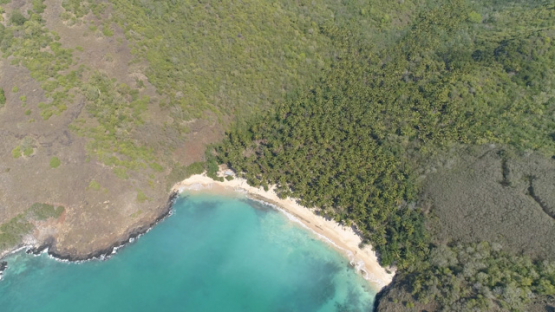 Nuku Hiva, aerial view of the coast of Aakapa and beach, 4K UHD