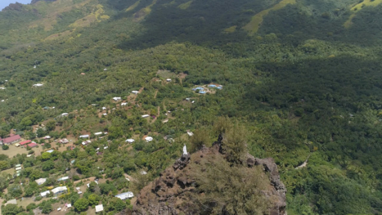 Nuku Hiva, aerial view of the valley Hatiheu and statue, 4K UHD