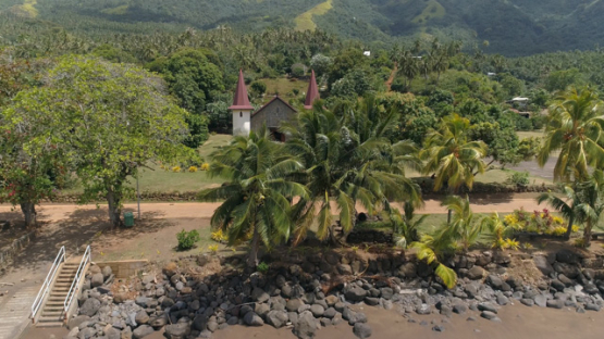 Nuku Hiva, aerial view of the valley Hatiheu and its church, 4K UHD