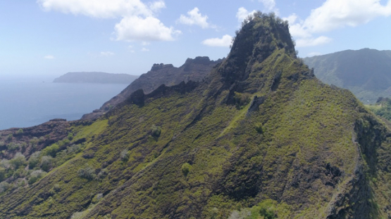 Hiva Oa, aerial view of the rocky coast of Puamau, 4K UHD