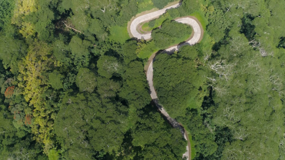 Hiva Oa, aerial view above the road and curves in the mountain, 4K UHD
