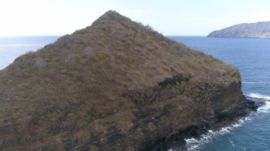 Hiva Oa, aerial view of Hanakee rock in the bay of Atuona, 4K UHD