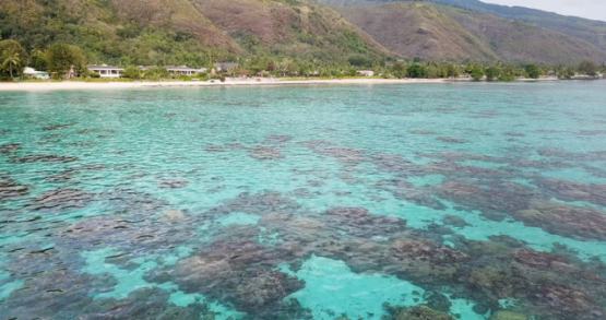 Tahiti 4k drone, aerial view following the lagoon