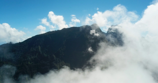 Tahiti 4K drone, aerial view of Mount Orohena out of the clouds