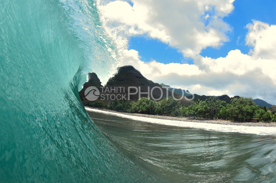 photography taken inside a tube wave at nuku hiva beach