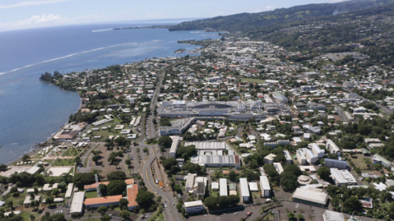 Aerial drone view of Tahiti, town of Arue and hospital, 4K UHD