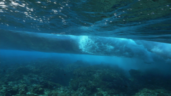 Tahiti, Big Wave shot from underwater near the coral reef