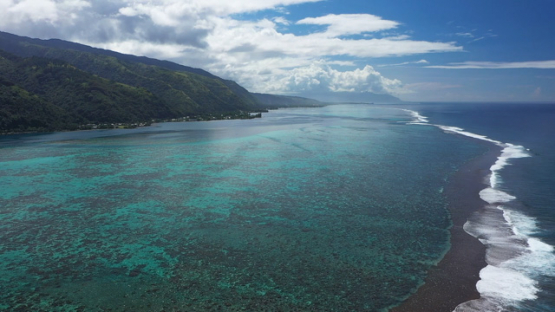 Tahiti, aerial drone view of the barrier reef and the coast line of Paea 