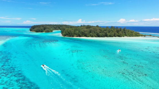 Aerial drone view of the lagoon of Moorea and islets in the turquoise lagoon