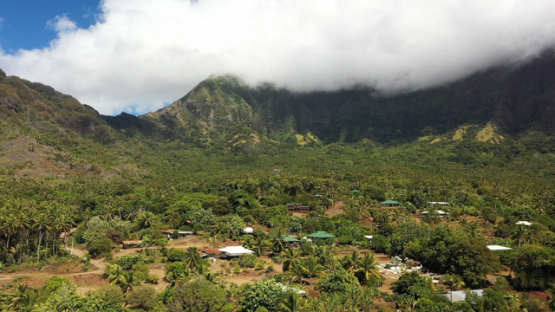 Hiva Oa, aerial drone view of the village of Puamau