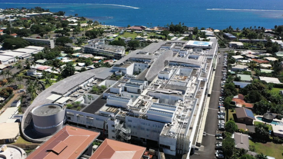 Aerial drone view of Tahiti, town of Arue and hospital Taone