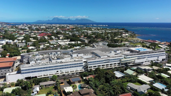 Aerial drone view of Tahiti, town of Arue and hospital Taone