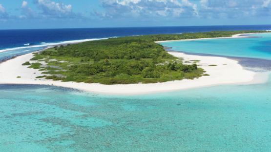 Atoll of Anuanuranga, aerial view by drone of the lagoon, Tuamotu archipelago, 4K UHD