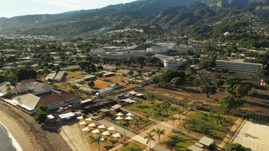 Aerial drone view of Tahiti, above the Park Aorai, towards the hospital