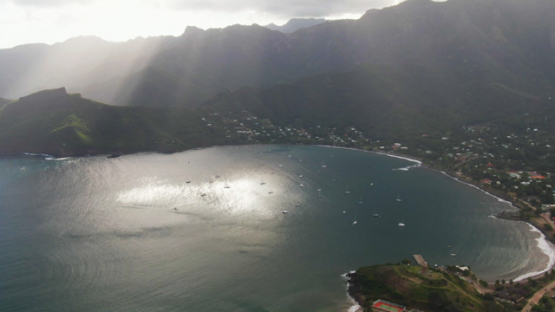 Nuku Hiva, aerial view of the Bay of Taiohae at the end of the day, 4K UHD