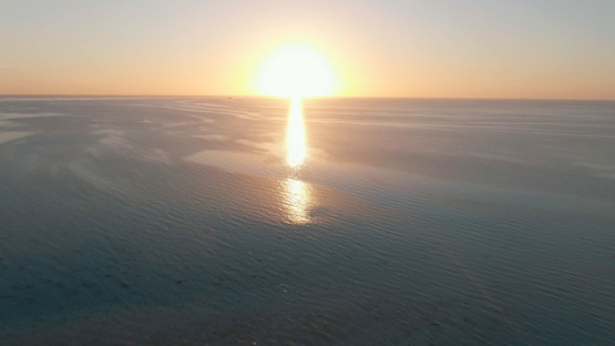 South of Fakarava, aerial view by drone of the sunset, 4K UHD
