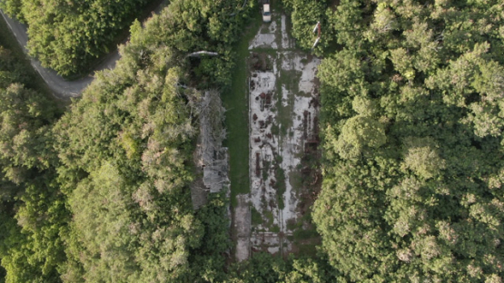Aerial top down drone view of the island Makatea, rusted phosphate mill ruins, 2K7