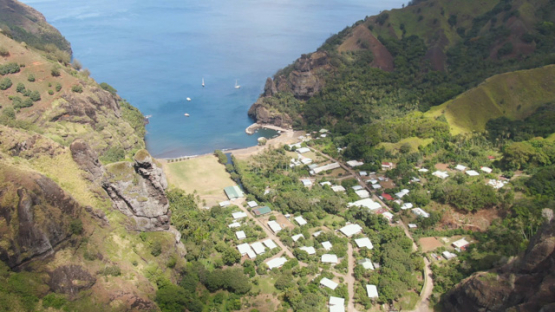 Aerial drone view of Fatu Hiva, virgins bay of the village Hanavave, Marquesas islands, 4K UHD