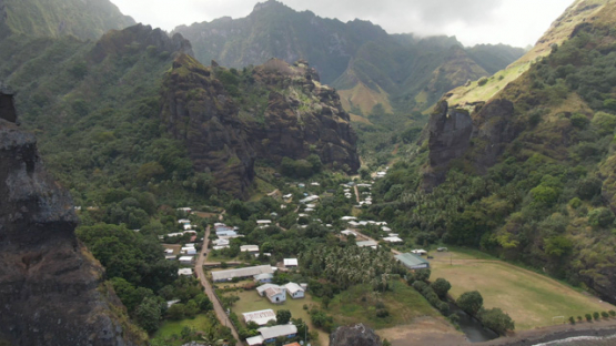 Aerial drone view of Fatu Hiva, virgins bay of Hanavave and village, Marquesas islands, 4K UHD
