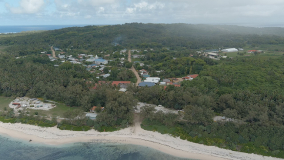 Rimatara, aerial view by drone of the village Amaru, 4K UHD