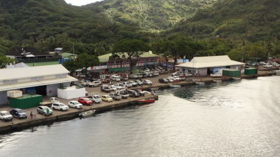 Huahine, aerial view by drone of the dock of the town Fare, 4K UHD