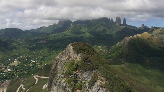 Ua Pou, Aerial view of Hakahau valley and peaks of the mountains, Marquesas islands