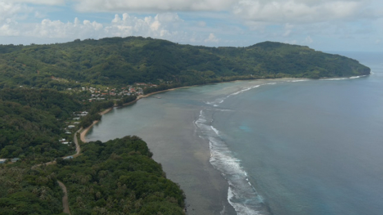 Rurutu, aerial drone view of the coast line and Moerai bay, 4K UHD