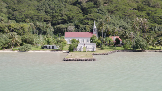 Taravai, Aerial drone view of the church Saint-Gabriel, Gambier archipelago, 4K UHD