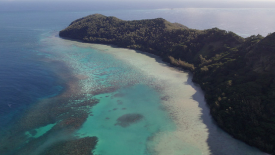 Gambier archipelago, aerial drone view of lagoon along Mangareva, 4K UHD