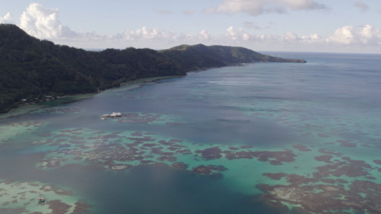 Gambier archipelago, aerial drone view of the lagoon along Mangareva, 4K UHD