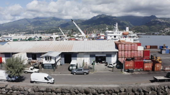 Cargo ship in the harbour of Papeete, Tahiti, French Polynesia