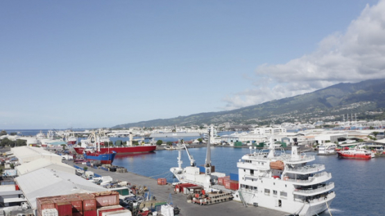 Cargo ships in the harbour of Papeete, Tahiti, French Polynesia