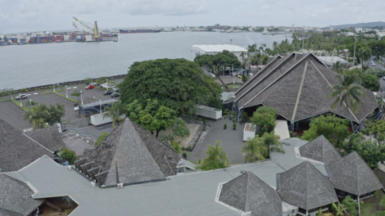 Papeete aerial drone view, above the roofs of the Culture house, 4K UHD