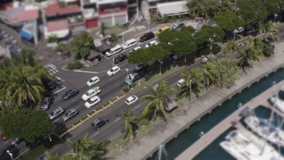 Papeete aerial drone view, Timelapse of Traffic on the boulevard, 4K UHD