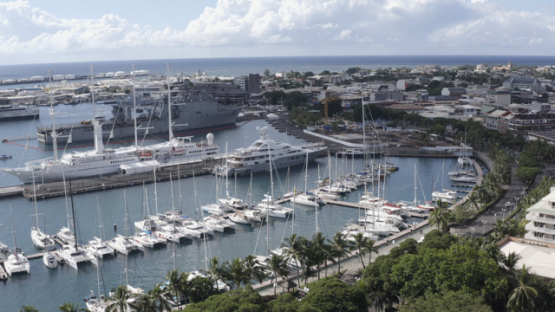 Papeete aerial drone view, marina, sailboats, and cruise ships, 4K UHD