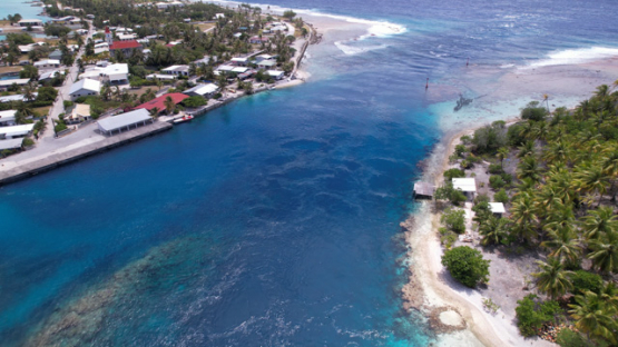 Katiu, aerial drone view of the island, Village and Pass Pakata, 5K4