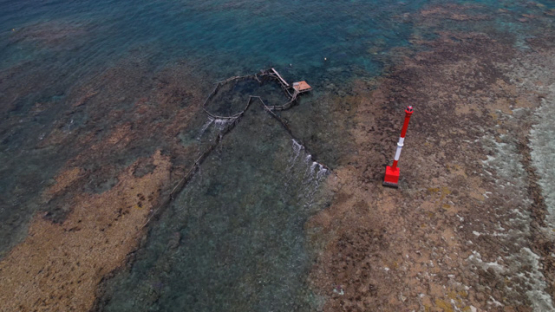 Katiu, Aerial drone view of the fish trap in the pass Pakata, 5K4