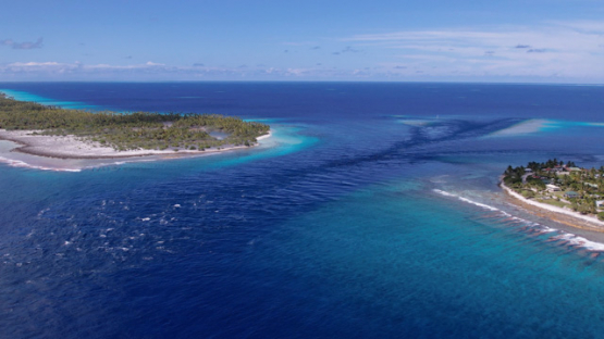 Makemo, aerial drone view of the island and Pass, UHD