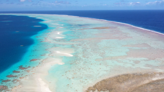 Hikueru, Aerial view of atoll, Tuamotu, Barrier reef, Lagoon and ocean, UHD